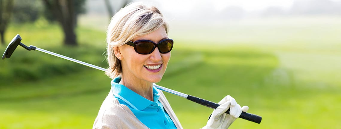 Older woman golf